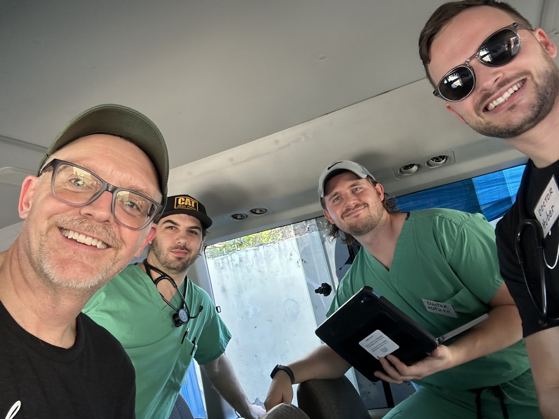 Docs creating a clinic on the bus